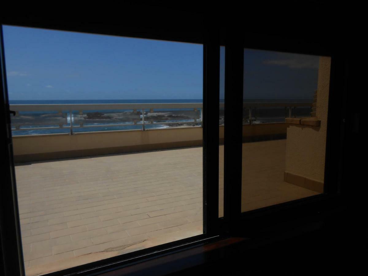Casa Na Praia Do 明德卢 外观 照片